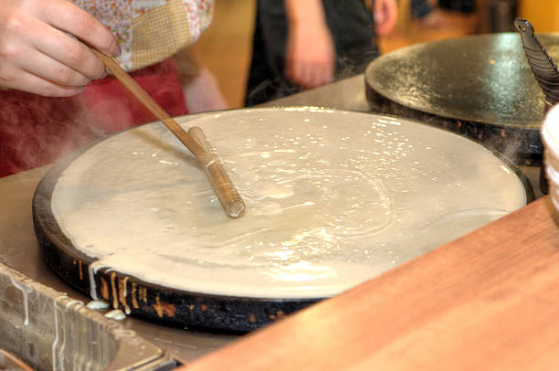 istock Baking pancakes - traditional Russian cuisine 159339786
