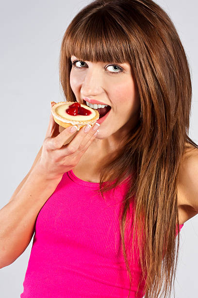istock Young beautiful woman with a cake 159341196