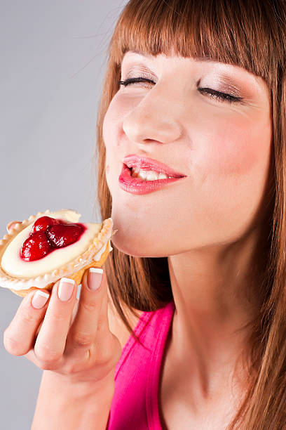 istock Young beautiful woman with a cake 159341246