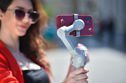 woman mobile selfie with gimbal