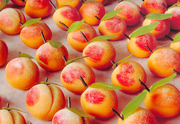 istock Marzipan peaches with sugar, typical sicilian sweets 159345565