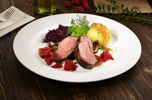 Wild Boar Steak with red Cabbage and Potato Dumpling - Wild Game Meat