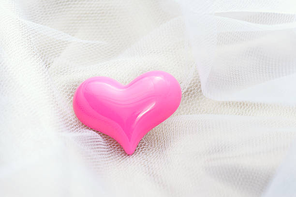 Pink heart on a white veil for all kind of romantic occasions