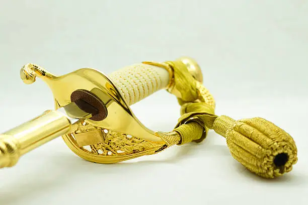 Navy sword hilt made from yellow metal