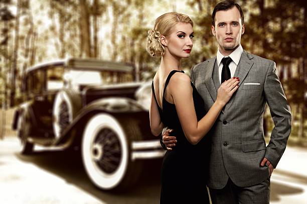 istock Retro couple against old car 159351268