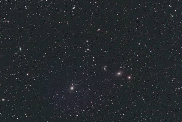 istock Messier 87 and Markarian Chain (Messier 84, Messier 86, NGC 4477, NGC 4473, NGC 4461, NGC 4458, NGC 4438 and NGC 4435) in Virgo 1593561117