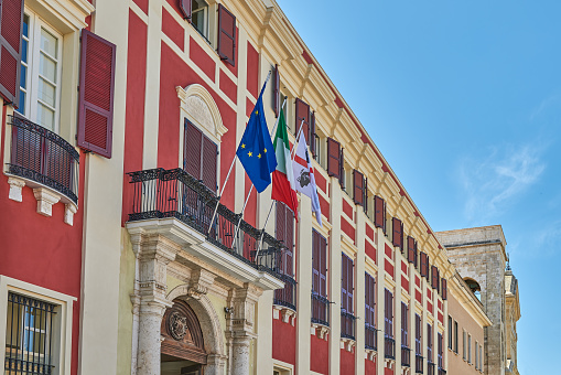 Cagliari, Italy - July 4, 2023:  Palazzo square, the facade of the Regio palace