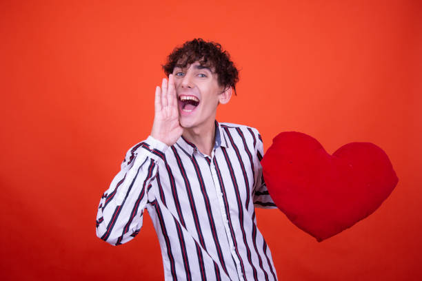 istock Valentine's day and cheerful guy. 1593652912