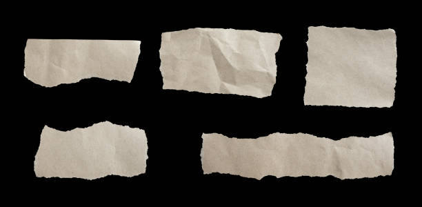 istock Set of torn paper pieces isolated on black background. 1593672054