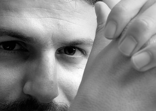 istock Face of man and hand. 159370809