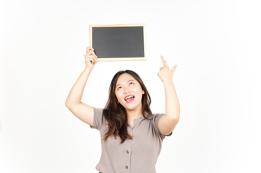 Showing, Presenting and holding Blank Blackboard Of Beautiful Asian Woman Isolated On White