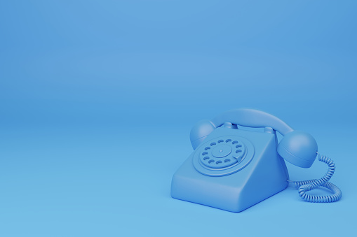Front view of blue retro telephone  on a blue background. 3D Illustration.