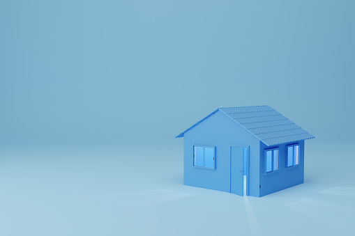 Front view of a digital generated house isolated with copy space on a blue background