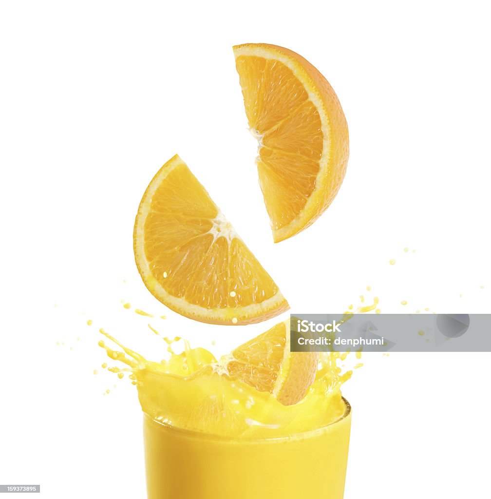 Jugo de naranja y rebanadas - Foto de stock de Alimento libre de derechos