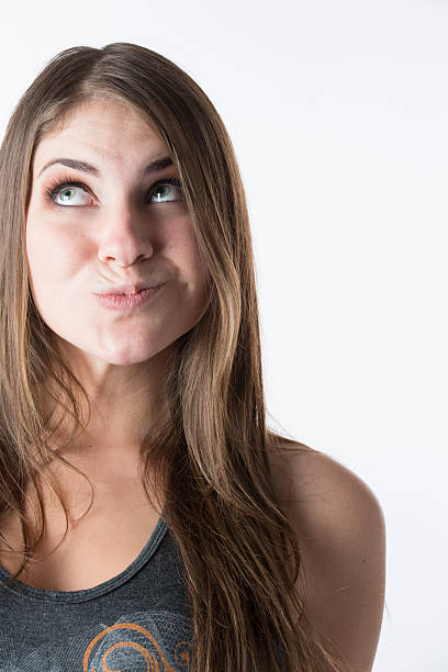 istock Beautiful young woman looking up 159375266
