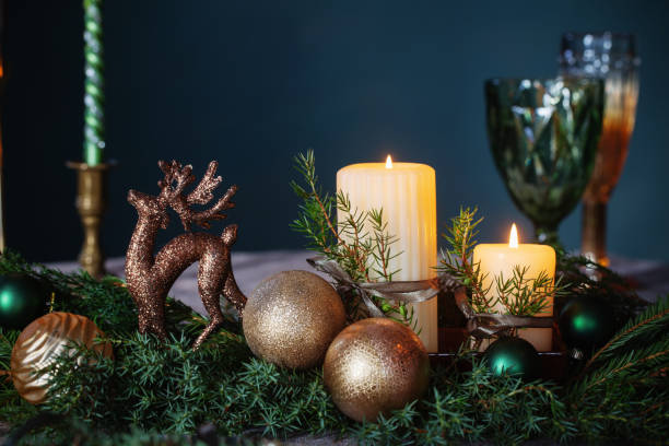 istock green and golden christmas decor on table on dark background 1593758992