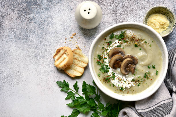 istock Cauliflower soup with mushrooms. Top view with copy space. 1593807753