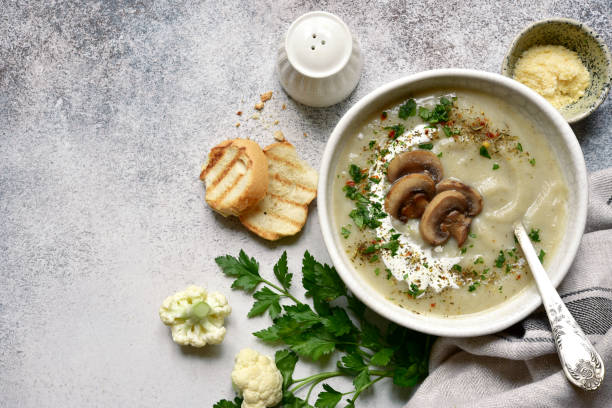 istock Cauliflower soup with mushrooms. Top view with copy space. 1593809889