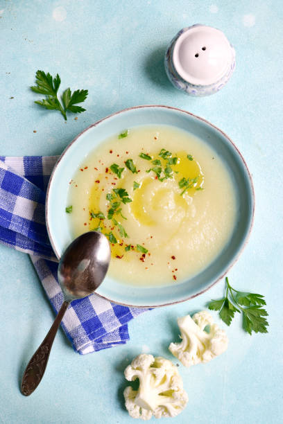 istock Cauliflower potato soup. Top view with copy space. 1593815381