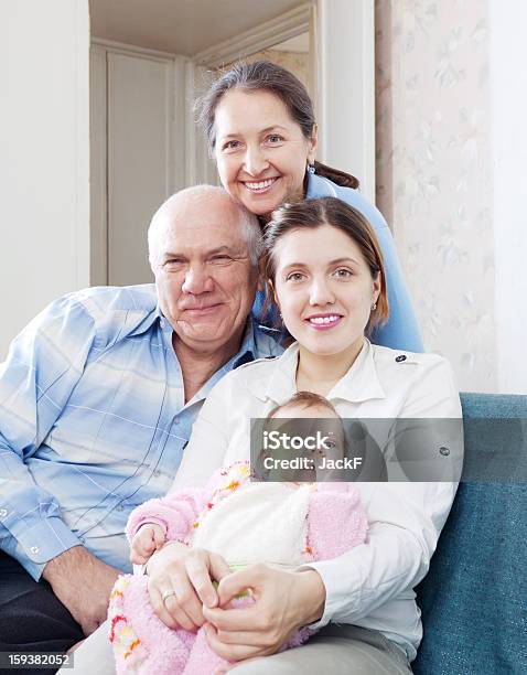 Happy Grandparents With Daughter And Granddaughter Stock Photo - Download Image Now - 40-49 Years, 50-59 Years, Active Seniors