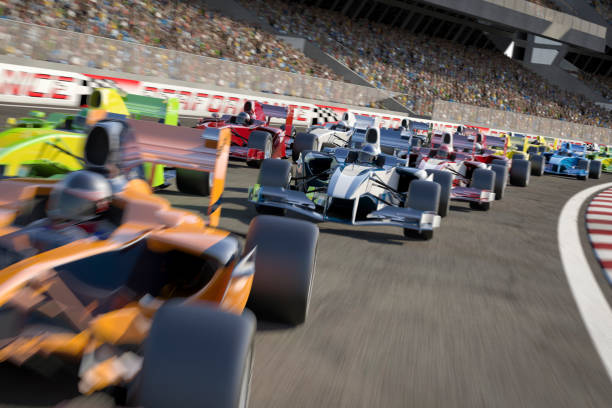 Formula One Type Racing Formula one type racing cars speeding down around a bend in the track in front of a stadium filled with people. All elements are designed and modelled by myself. All markings and designs are entirely fictitious. Very high resolution 3D render. motor racing track stock pictures, royalty-free photos & images