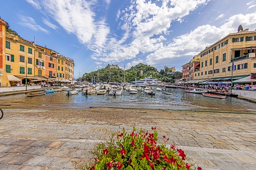 An idyllic view of the picturesque harbour of the Italian coastal town of Portofino during a sunny summer day