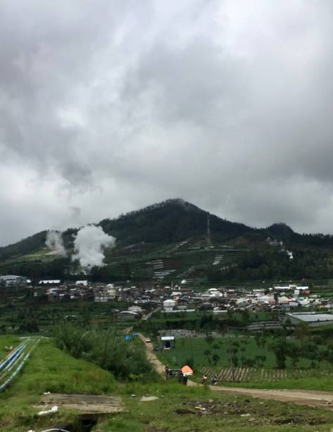 istock shoot the mountain from below and look at the village 1593930228