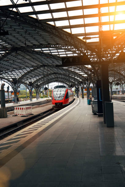 istock Rail Infrastructure Train Arrives at Cologne Station 1593993627