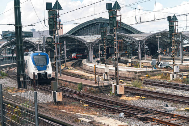 istock Rail Infrastructure Train Leaving Cologne Railroad Station 1594002167