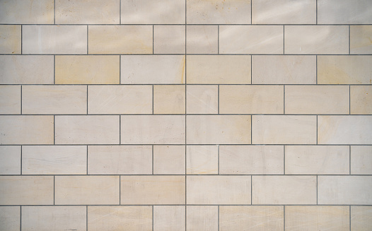 Close-up of a wall clad in limestone