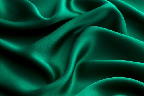 Green silk textile background
