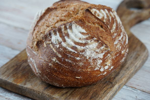 istock Fresh rye bread or whole grain bread. Healthy baked bread with crispy crust 1594071951