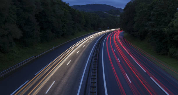 Car lights at night on the highway