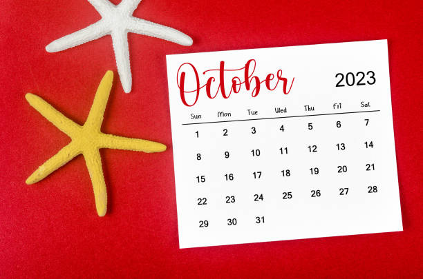 istock The October 2023 Monthly calendar with Starfish on red background. 1594118570