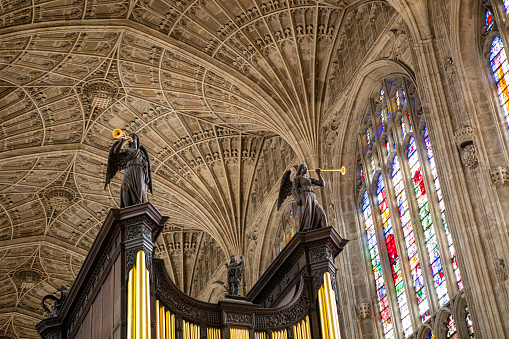 Cambridge Cambridgeshire UK 31st July 2023 \nThe newly restored organ in the Kings College Chapel with archangels playing trumpets