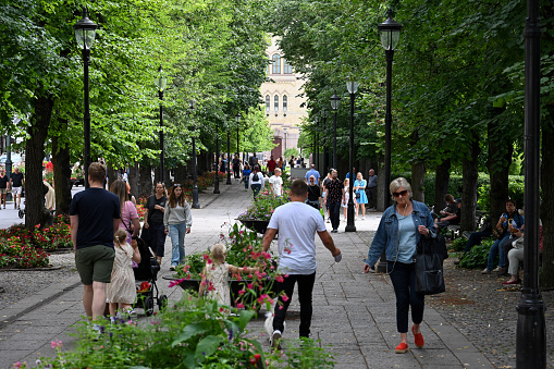 Oslo, Norway, July 7, 2023 - Karl Johan Street (Karl Johans Gate) promenade near Eidsvolls Plass in downtown Oslo.