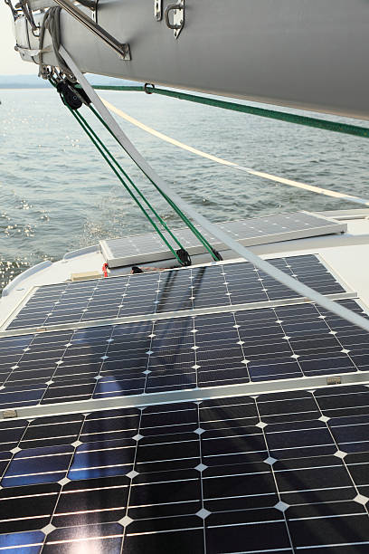 istock Solar Panels charging batteries aboard sail boat 159415236