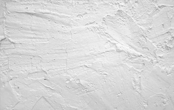 istock The bush of white mortar wall in loft style 1594156431
