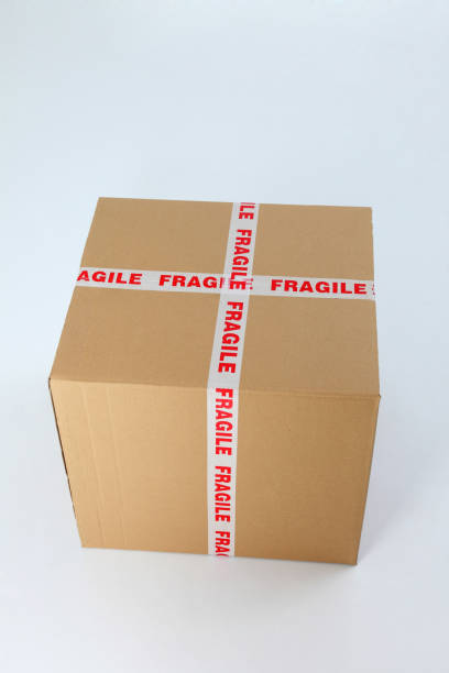 istock cardboard box sealed with a fragile sign 1594187517