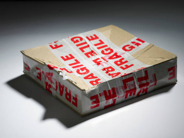 istock damaged box with the fragile sticker 1594199216