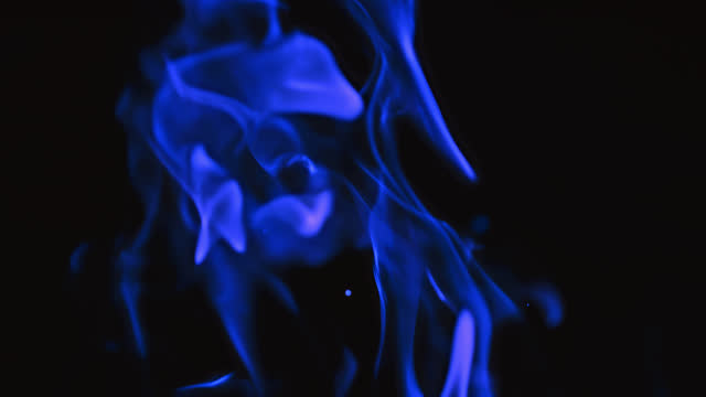 SLO MO Blue flames of fire on black background