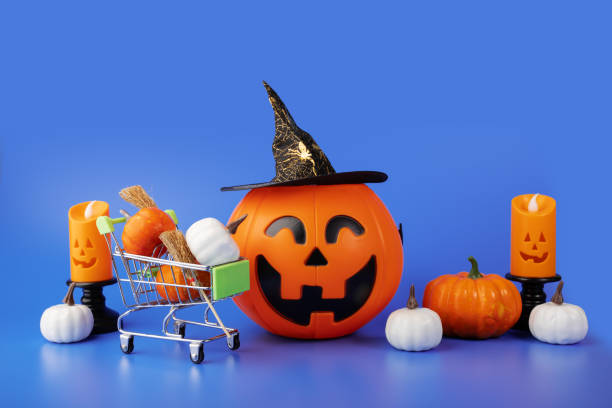 istock halloween background, halloween pumpkins in a witch hat, festive decorations 1594199859