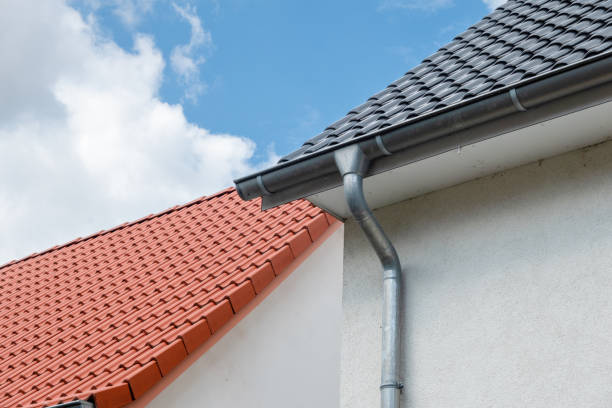 istock newly covered roofs in different colours next to each other 1594200938