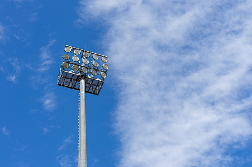 Low angle view floodlight pole against sky, Berlin Zehlendorf