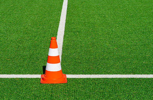 Traffic cone on soccer field