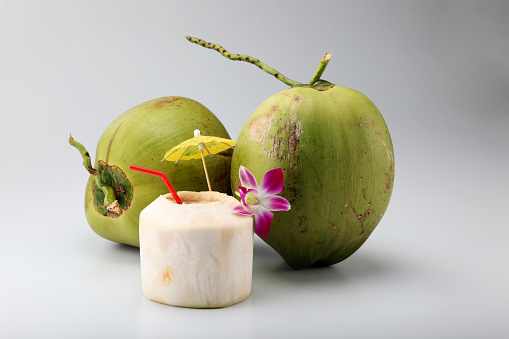 coconut drinks on the plain background