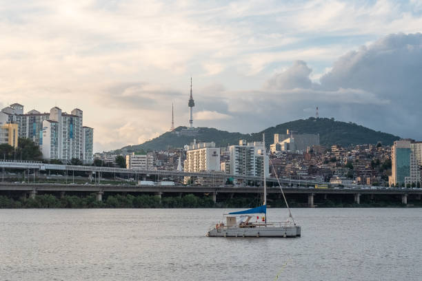 Seoul, South Korea - 14 July 2022 : sky before sunset in downtown Seoul over the Han River, with view of N Seoul Tower or Namsan Tower