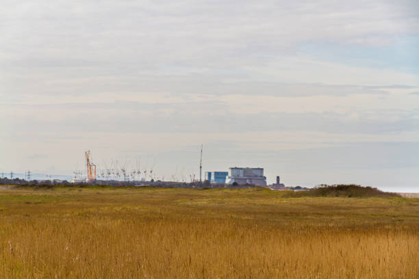 istock Nuclear Power Station in distance, copyspace on top, landscape. 1594291592