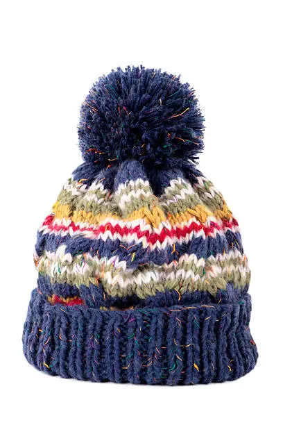 Blue bobble hat isolated against a white background.