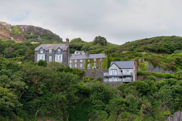 istock houses in the mountains with rain clouds 1594398010